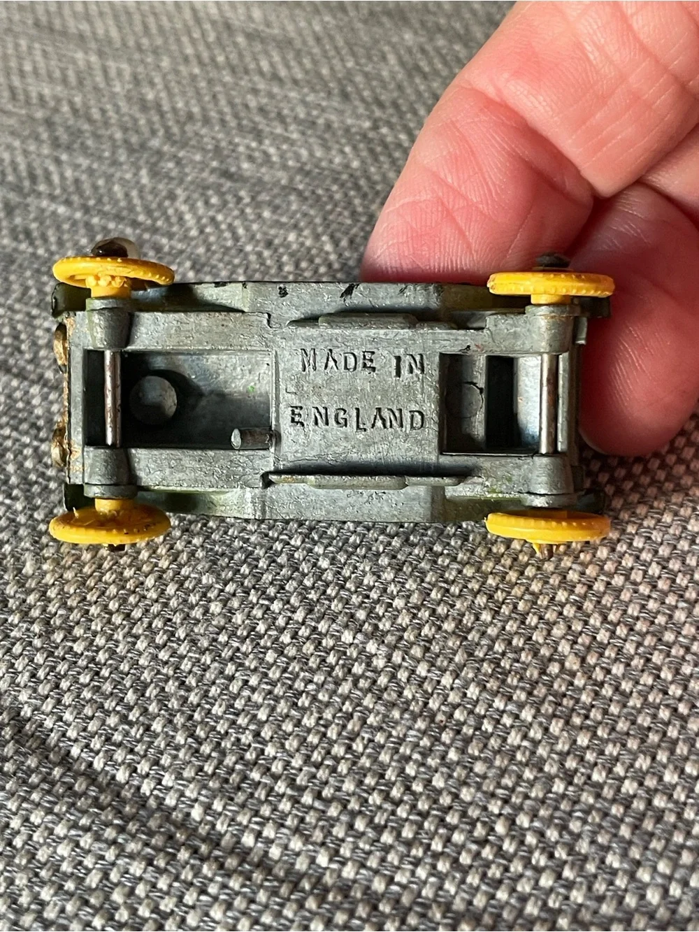 Vintage metal diecast car, made in England stamped on the bottom